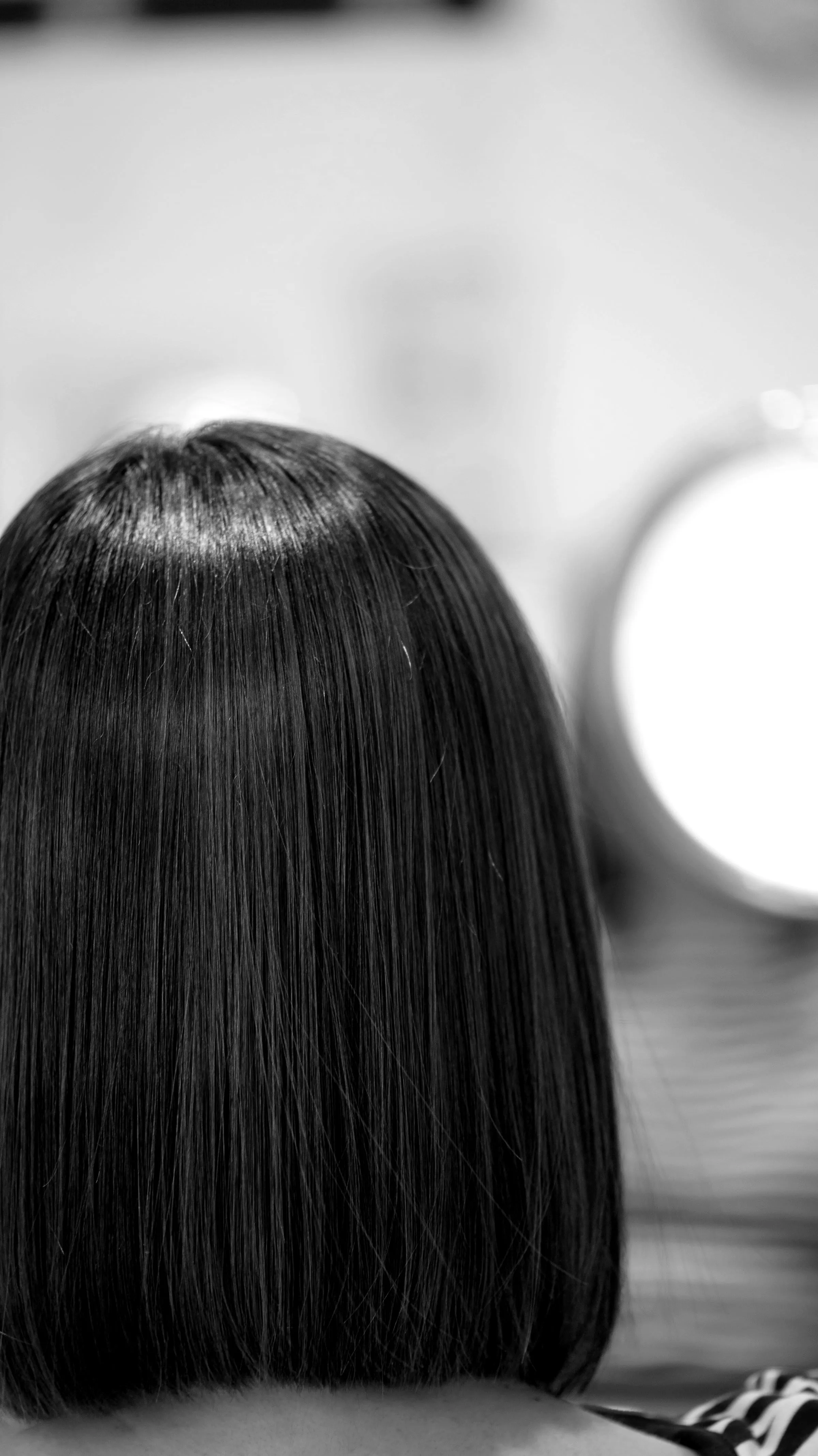 Capelli lisci appena tagliati, visti da dietro